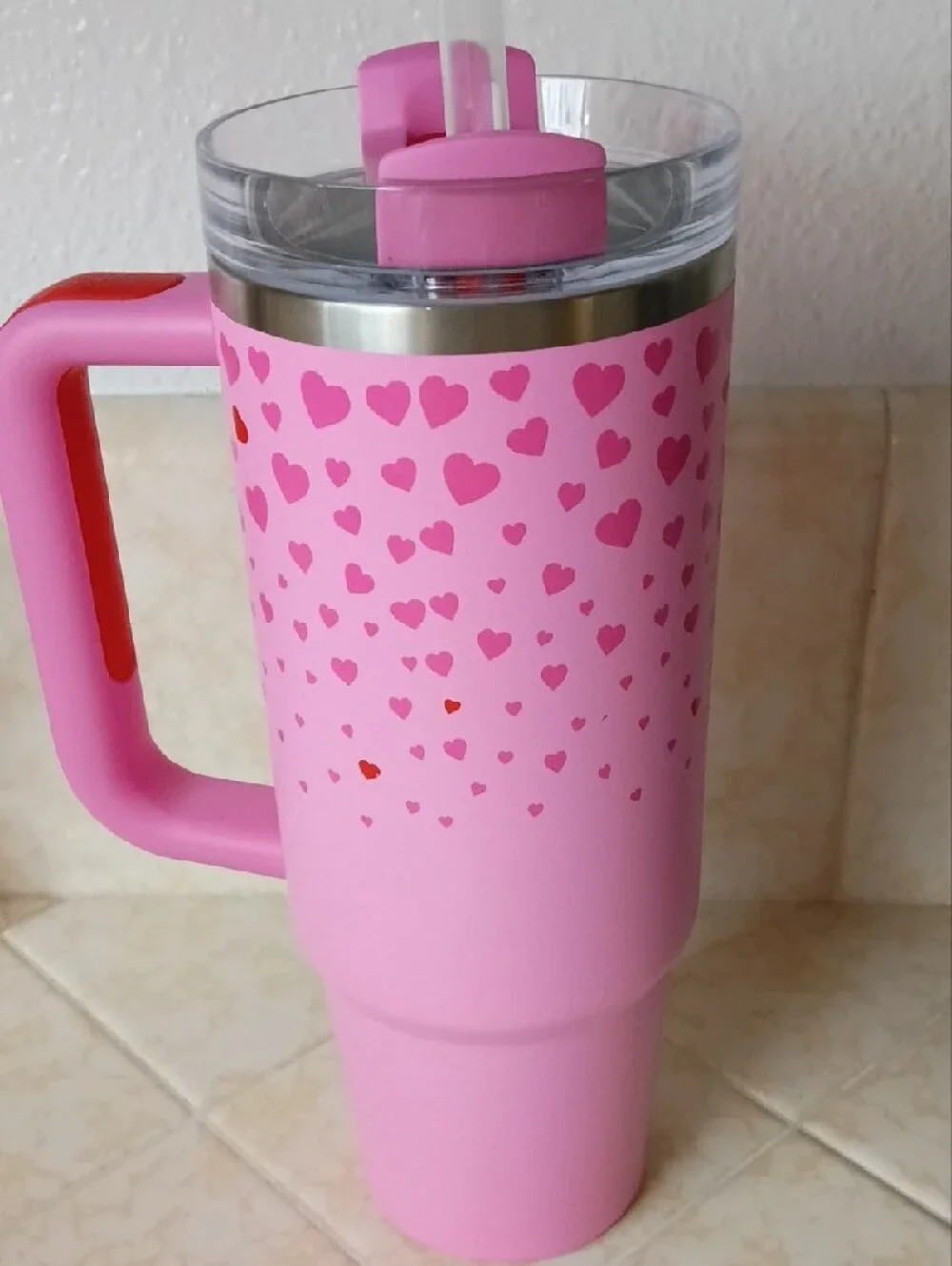 Stanley Pink Travel Mug with Red Logo and Heart Pattern Accent - Picture 3 of 6